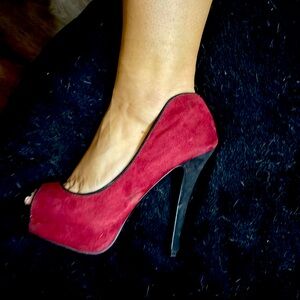 Red suede peeptoe pumps